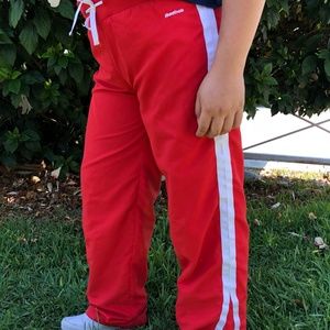 red reebok unisex track pants